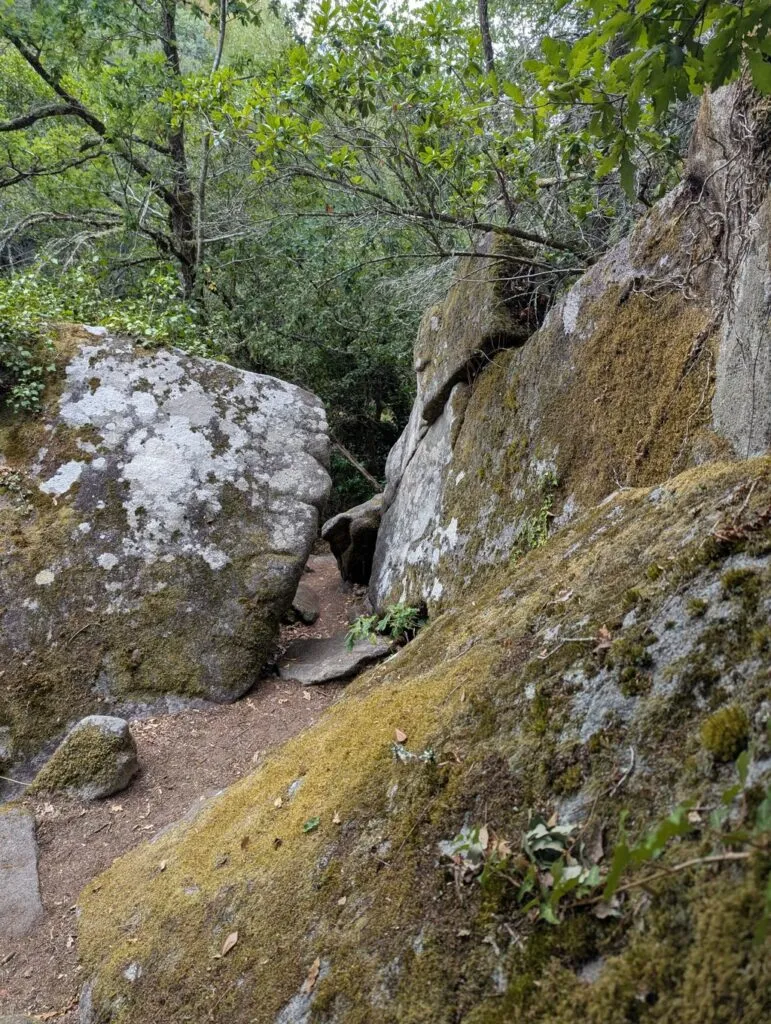 Narrow rocky passage on the trail to Fervenza do Mácara in Galicia